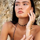 Amaanyi black onyx choker, close-up of black onyx catching the light