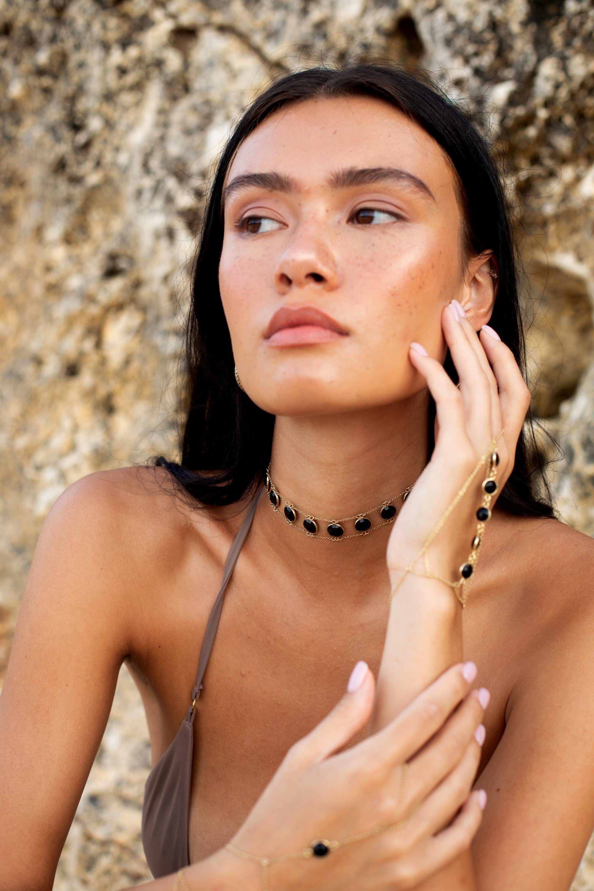 Amaanyi black onyx choker, close-up of black onyx catching the light