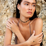 Amaanyi black onyx choker worn as a minimal statement necklace