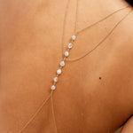 Amaanyi gemstone body chain styled with layered jewellery