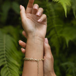 Oray bracelet, close-up of the hanging serpent detail