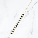 Amaanyi black onyx choker, product detail against a neutral background