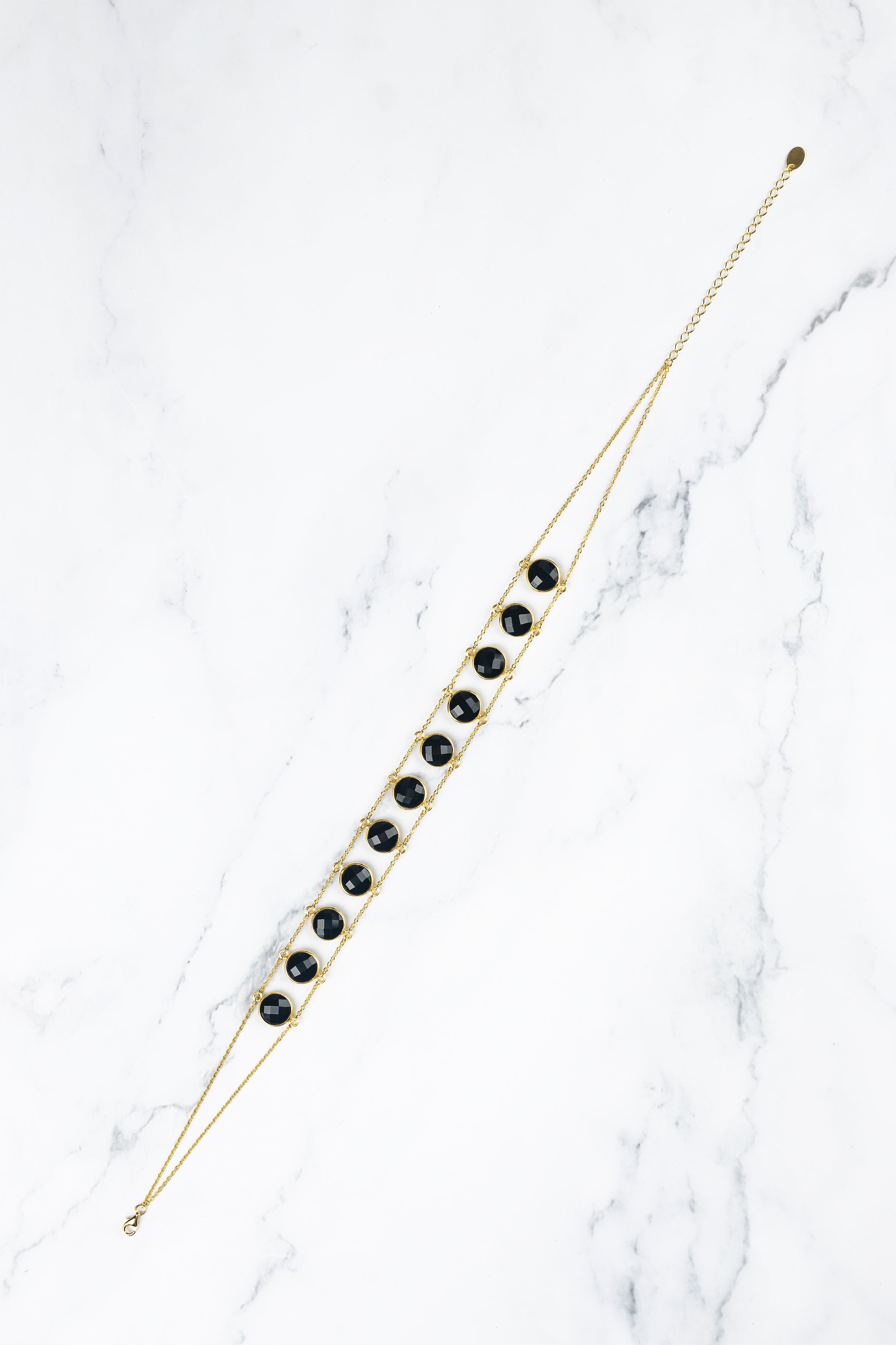 Amaanyi black onyx choker, product detail against a neutral background