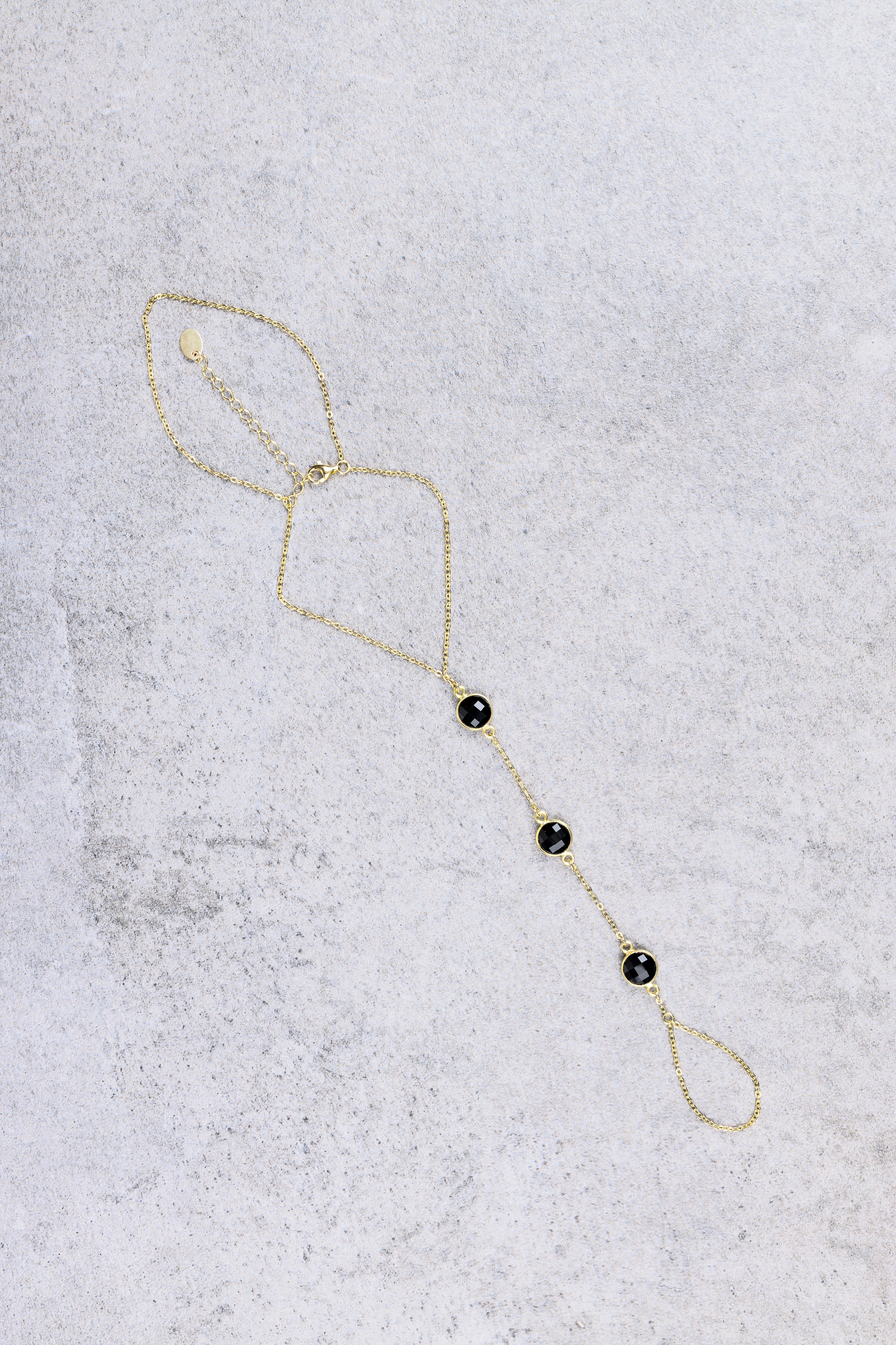 Nishati gemstone hand chain, flat lay product photo