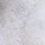 Sanje body chain, close-up of the mirrored triangle design