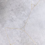 Sanje body chain, close-up of the mirrored triangle design
