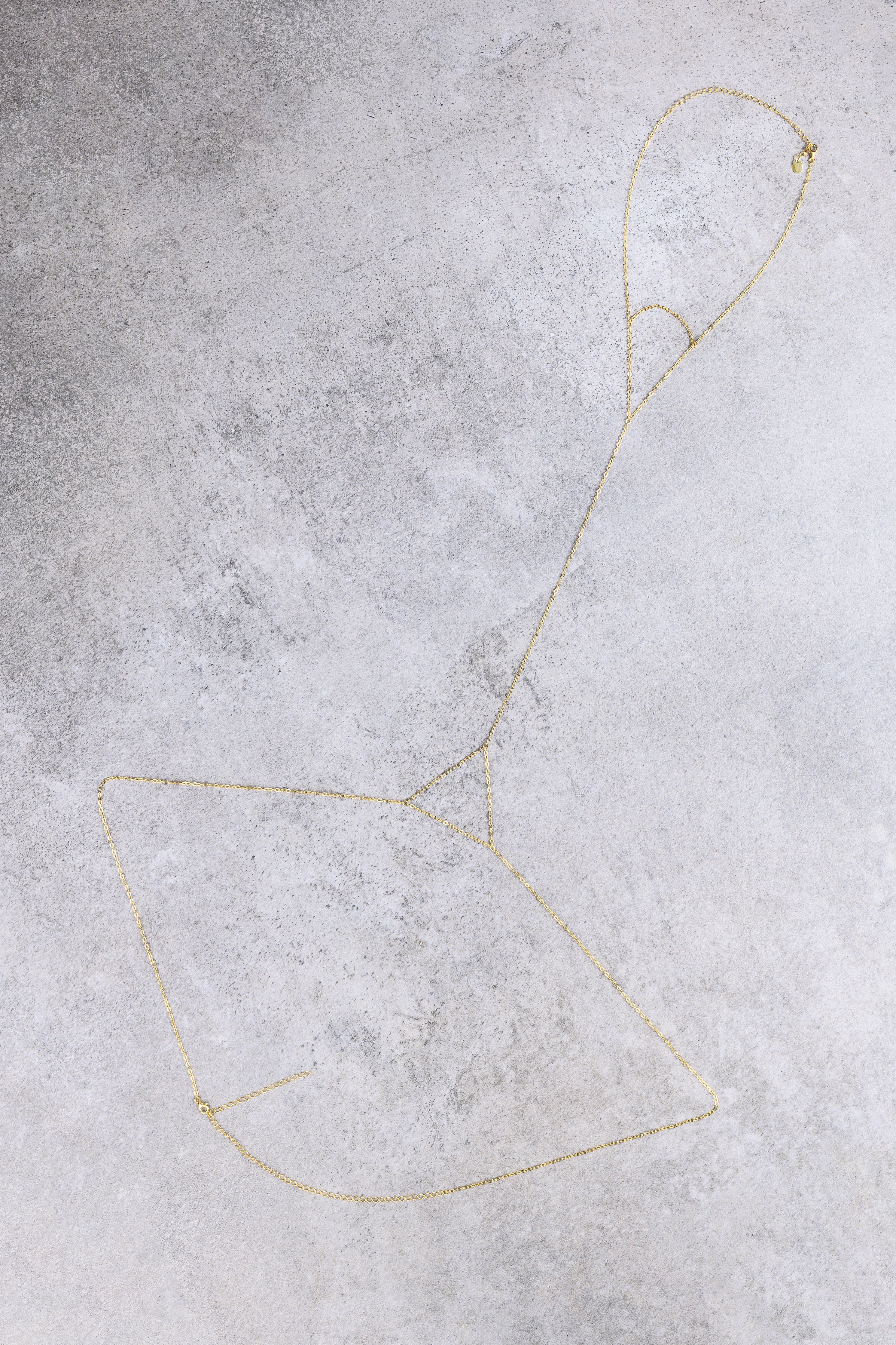 Sanje body chain, close-up of the mirrored triangle design