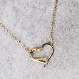 Amo belly chain worn on bare skin, side view