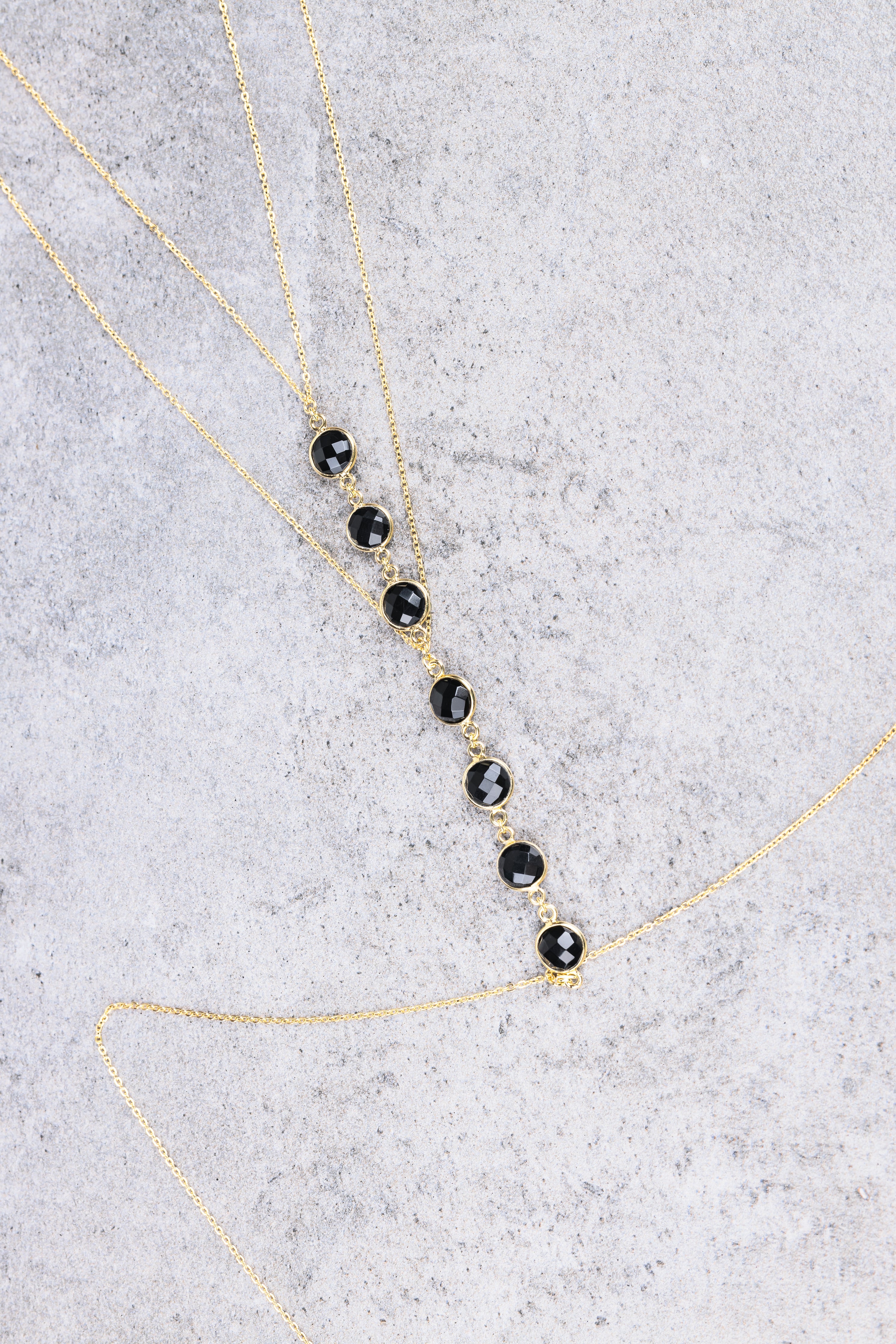 Amaanyi gemstone body chain, product photo on plain background