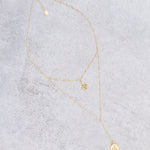 Kanasu necklace, close-up of the double-serpent detail