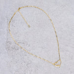 Amo necklace worn as part of a matching set with the Amo earrings