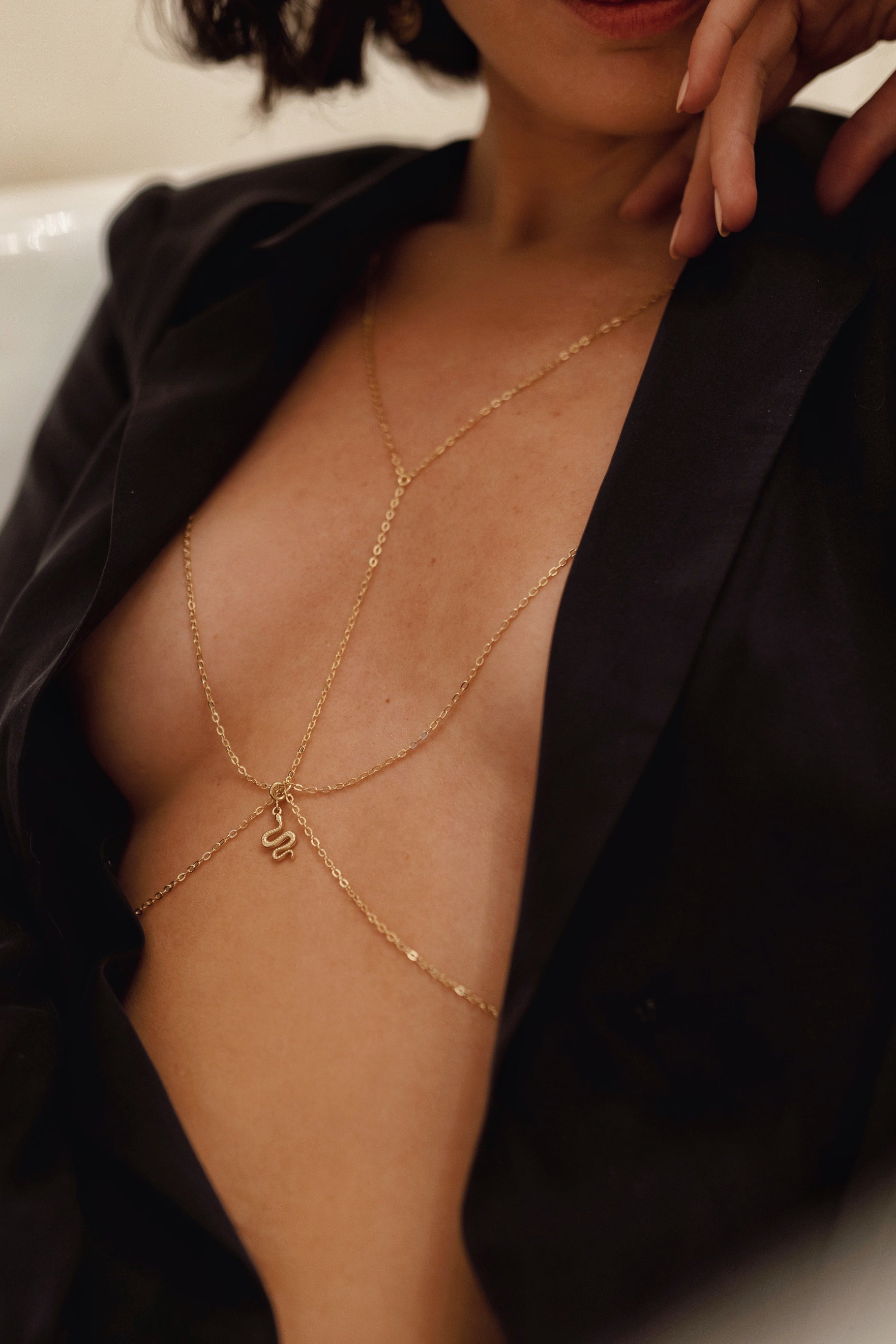 Lota body chain worn styled at the back