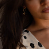 Ejo serpent earrings in sterling silver, curved silhouette