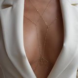 Neoma body chain, product detail against a neutral background
