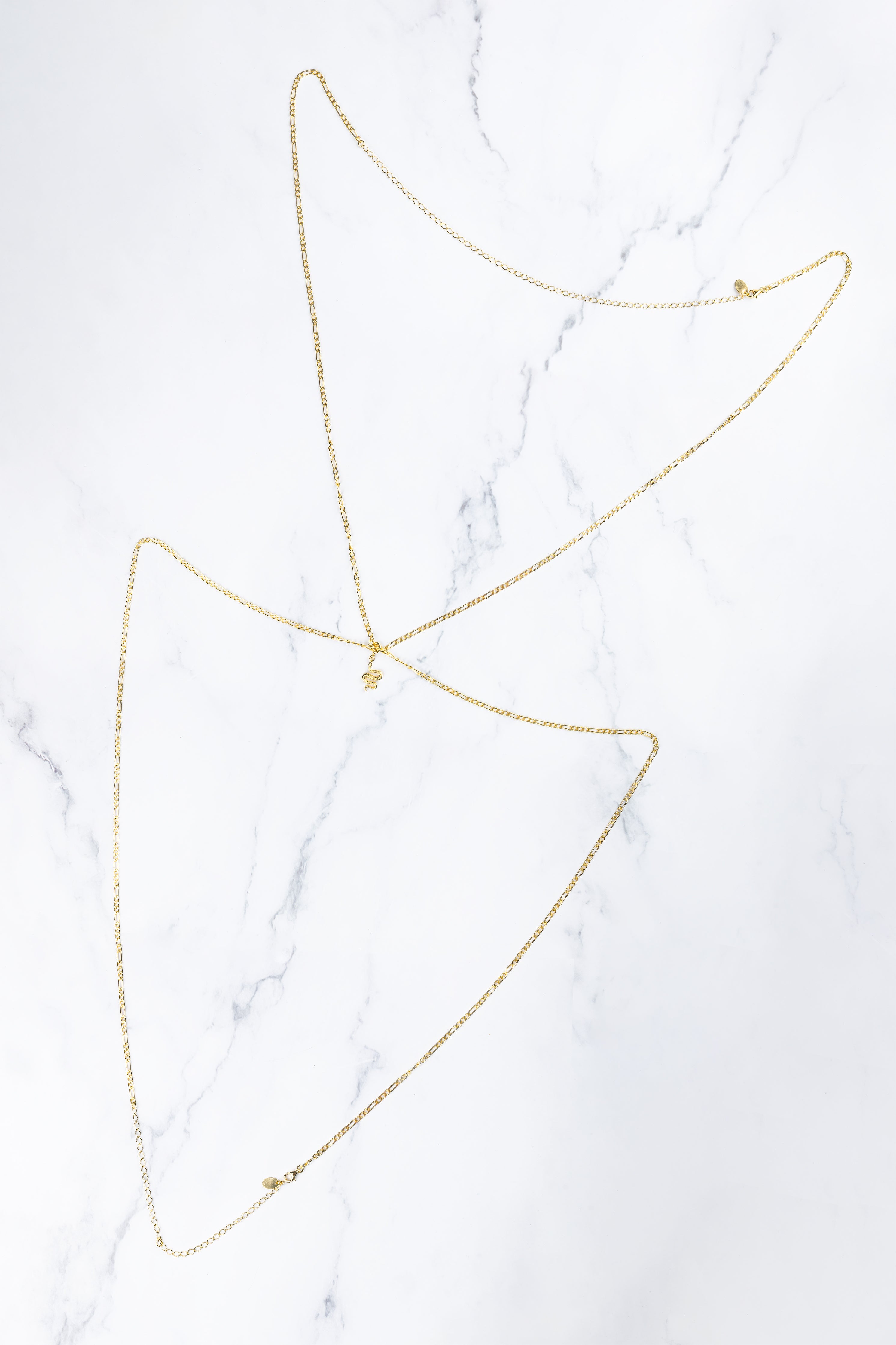 Kiyal body chain, product detail against a neutral background