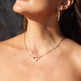 Amo necklace in gold-plated silver, worn as a focal piece