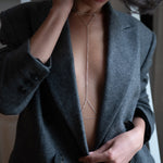 Sanje body chain worn tracing the neck and waist
