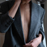 Sanje body chain worn tracing the neck and waist