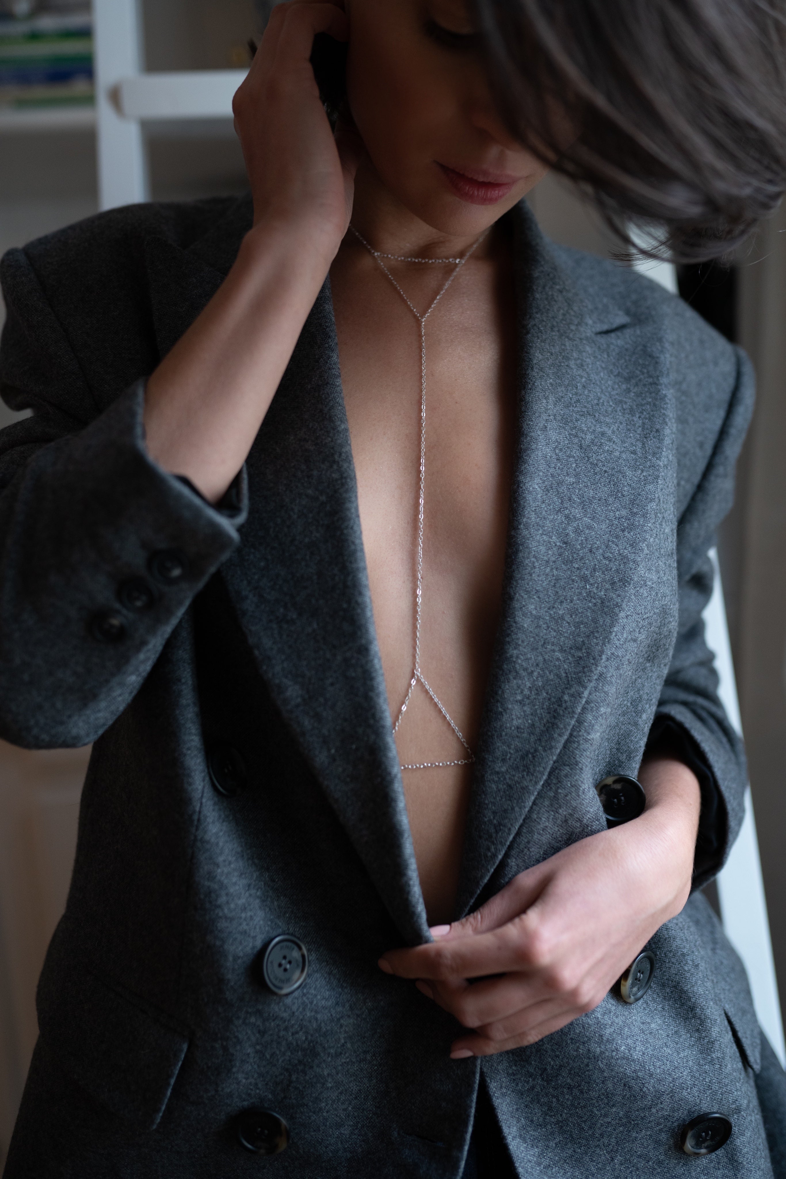 Sanje body chain worn tracing the neck and waist