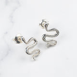 Ular serpent earrings, close-up of the curved silhouette