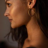 Sarpe serpent hoop earrings in sterling silver, sculptural silhouette