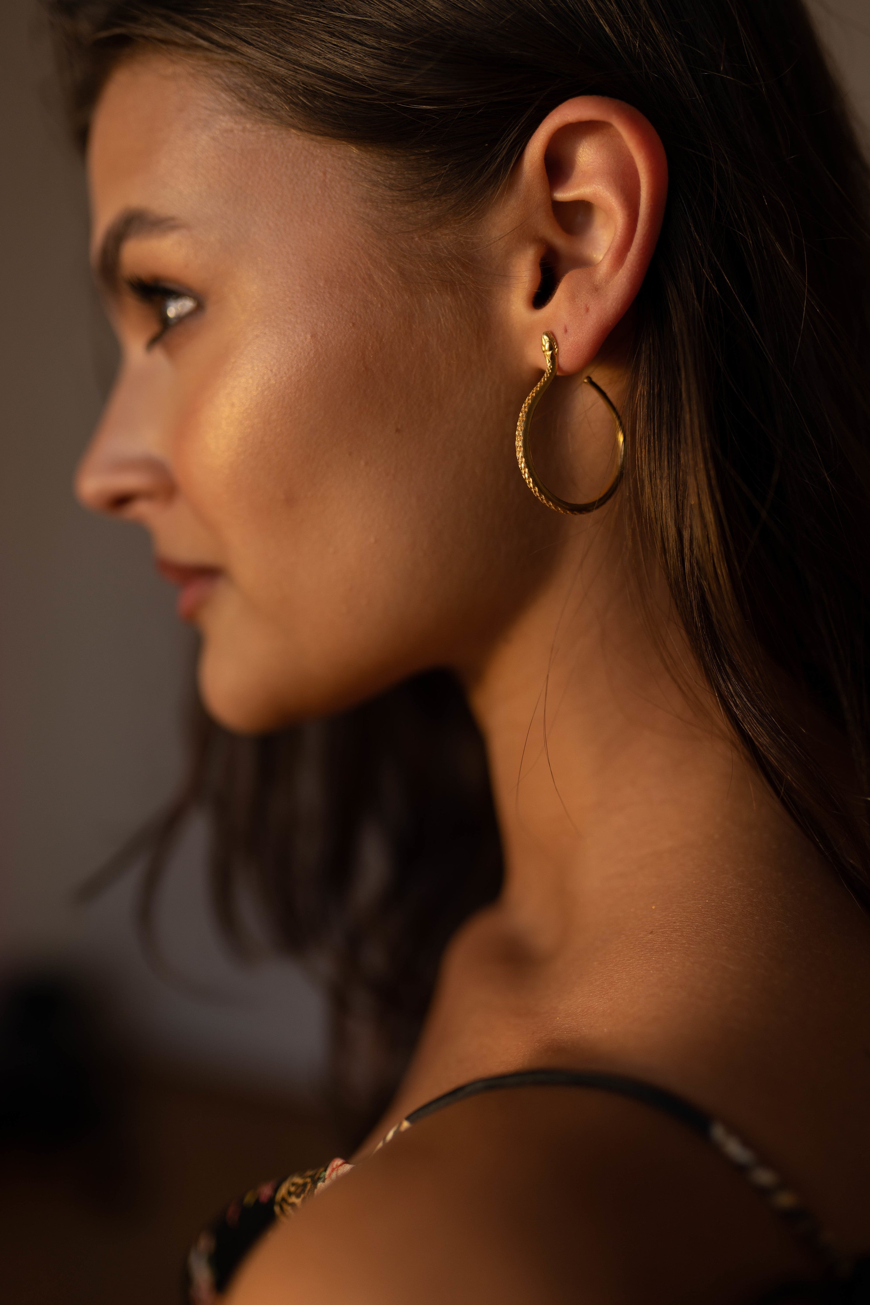 Sarpe serpent hoop earrings in sterling silver, sculptural silhouette