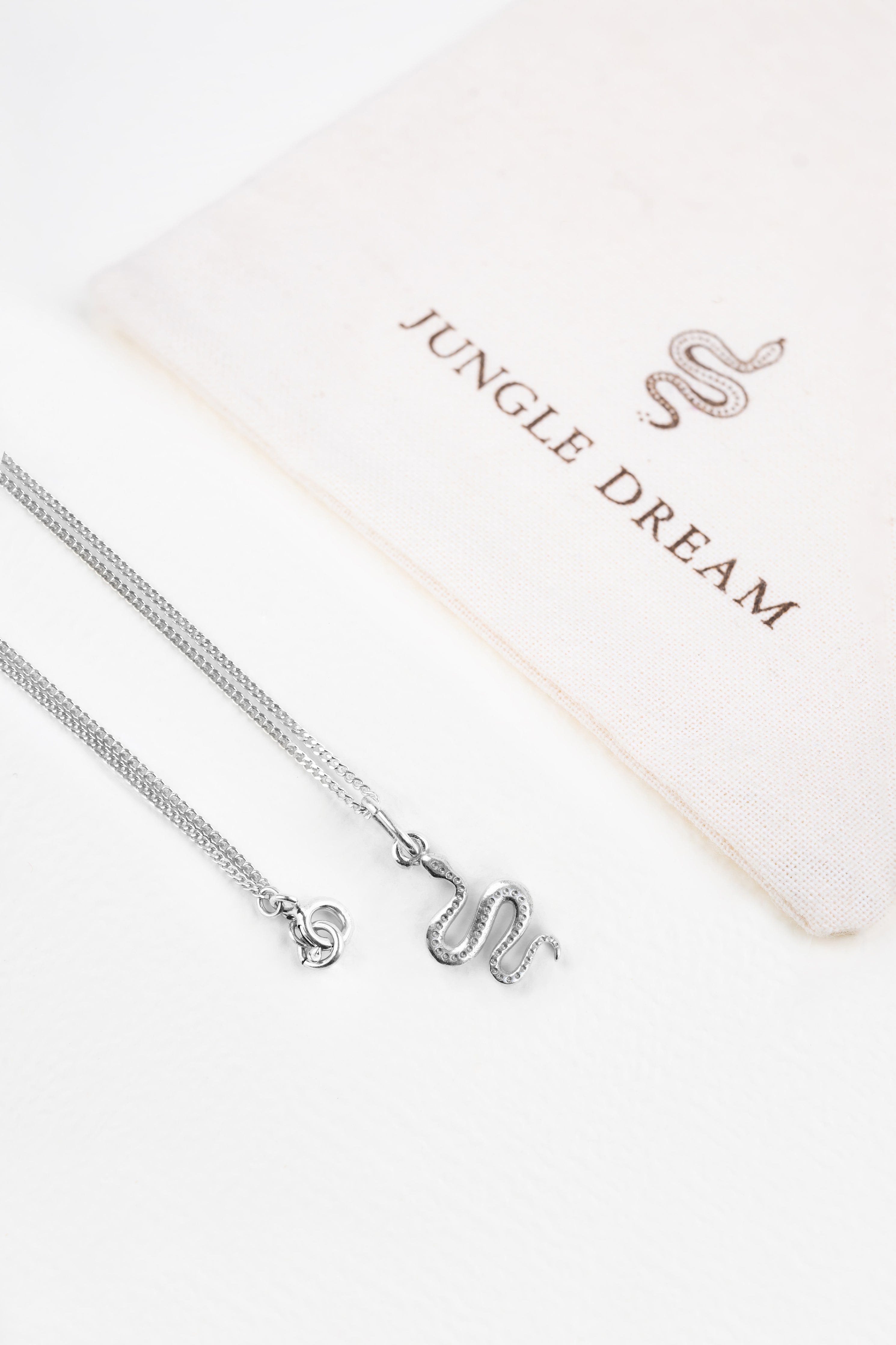 Ular necklace in gold-plated silver, worn on the neck
