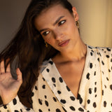 Ejo serpent earrings, lifestyle styling shot