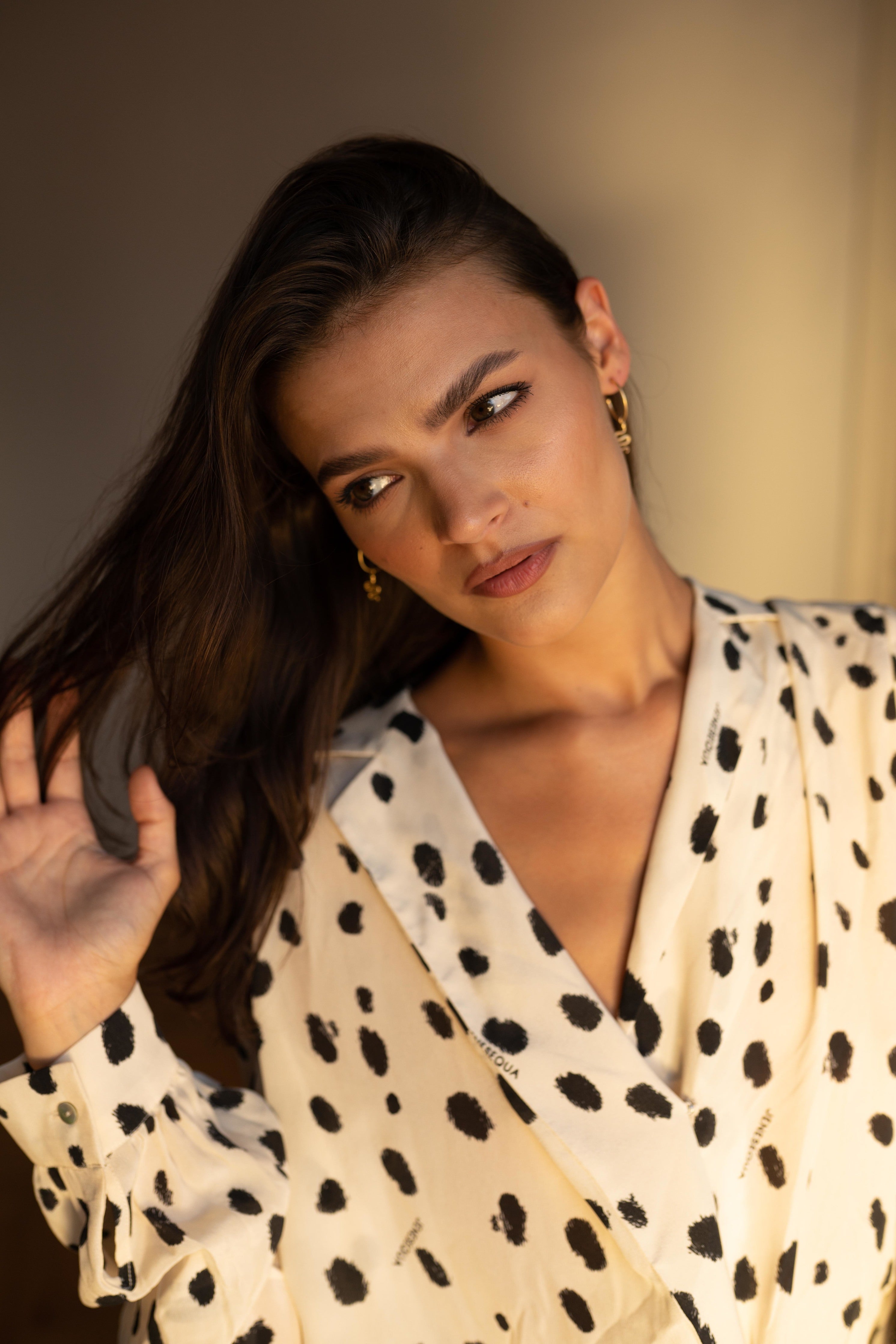 Ejo serpent earrings, lifestyle styling shot