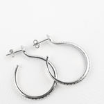 Sarpe serpent hoop earrings, close-up of serpent scale detail