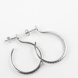 Sarpe serpent hoop earrings, close-up of serpent scale detail