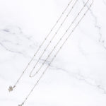 Tove face chain, close-up of the serpent detail at the ends