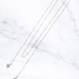 Tove face chain, close-up of the serpent detail at the ends