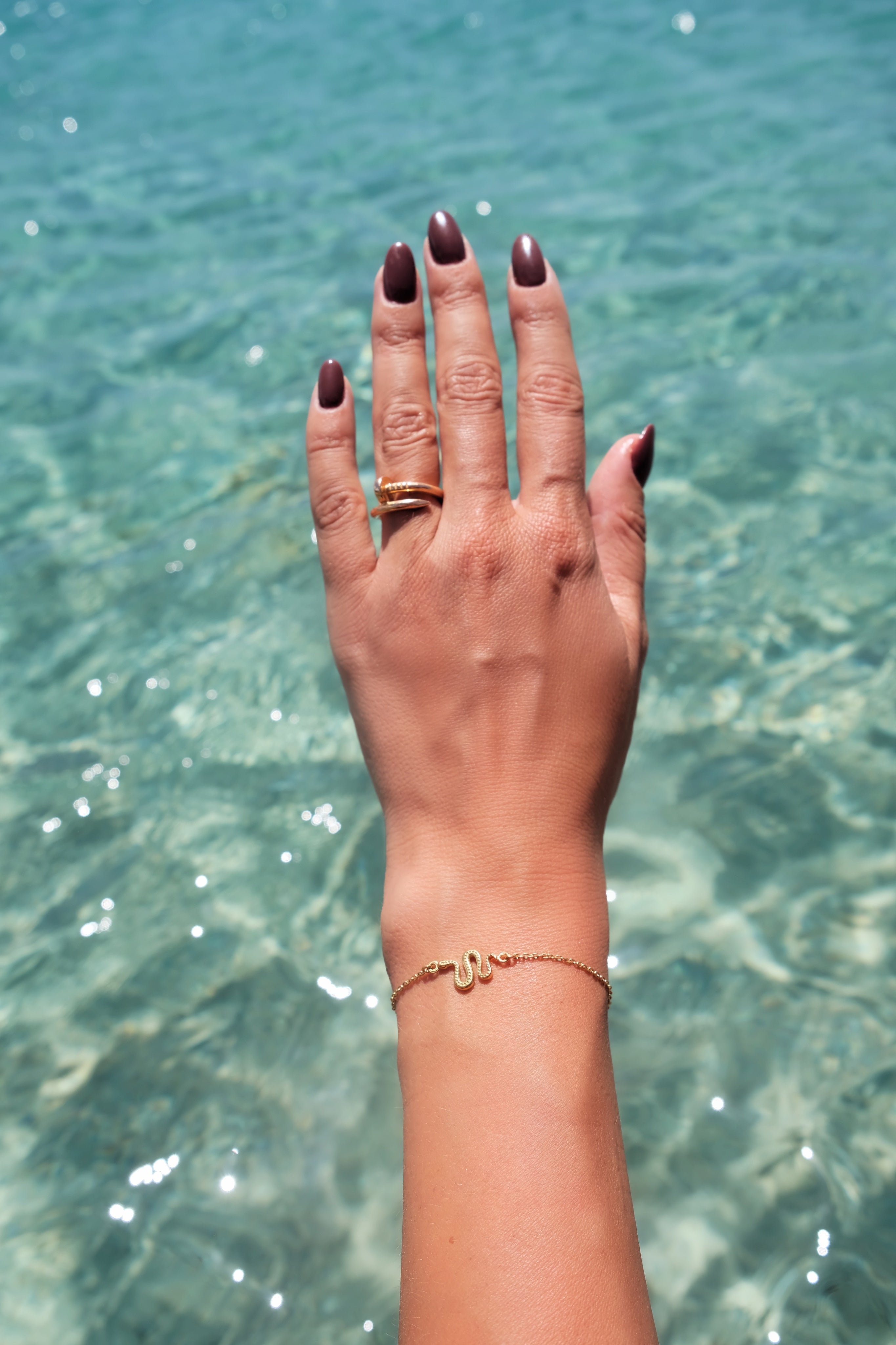 Ular serpent bracelet, flat lay product photo